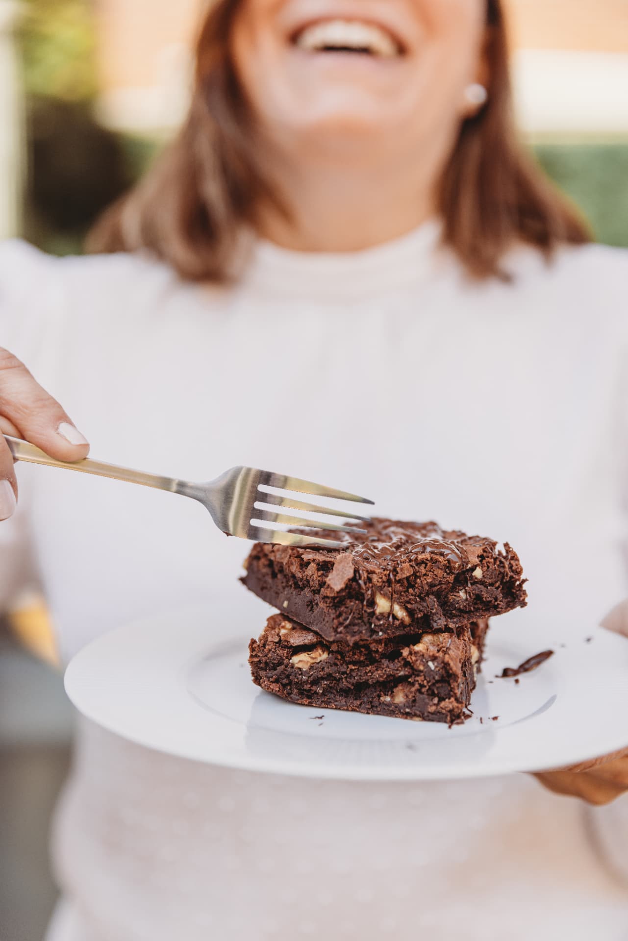 A guest enjoying Oma's homemade brownies
