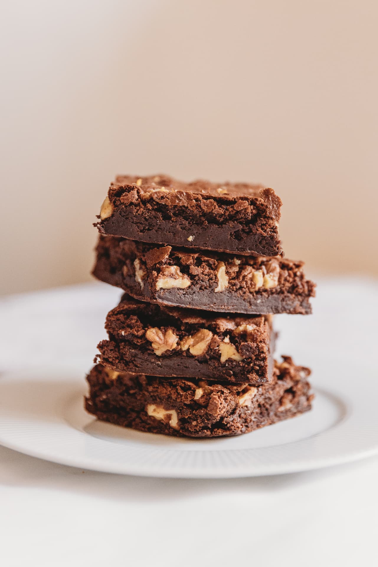 Stack of homemade brownies with walnuts